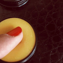 Load image into Gallery viewer, Lip balm, plant based, nourishing, oHHoA full spectrum CBD lip balm containing beneficial minor cannabinoids and terpenes complemented with a blend of all-natural moisturizing and soothing ingredients. Peppermint and grapefruit bring a cooling and zesty feel with antibacterial and pain relieving properties. Packed with vitamins A and E, omega 3, 6 and 9, our lip balm is designed to improve hydration, ease inflammation and protect for perfectly kissable lips.